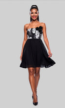 Load image into Gallery viewer, strapless black and white floral dress on a gray background
