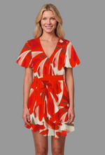 Load image into Gallery viewer, Scarlett Bloom Flutter Sleeve ruffle hem dress. 
